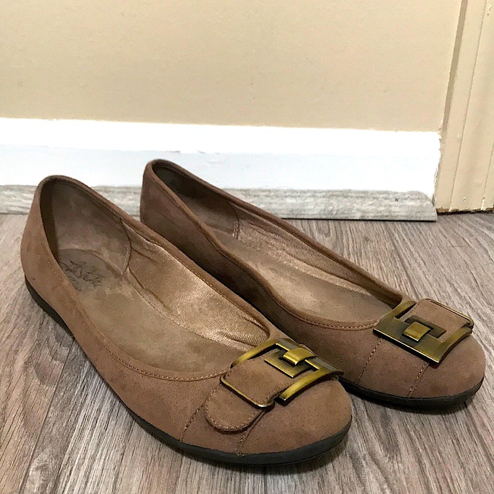Brown buckle flats
